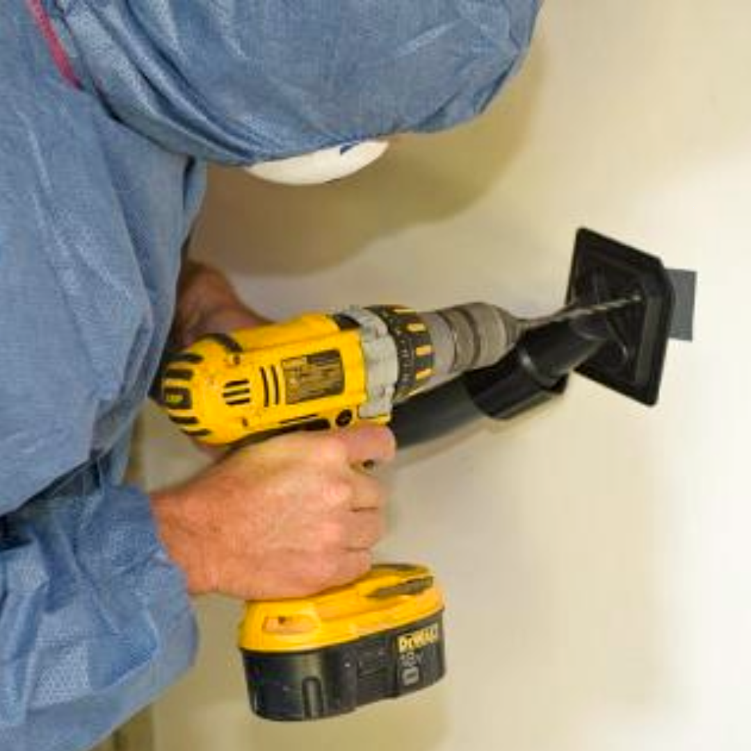Shadow vacuuming to manage asbestos dust release in domestic properties